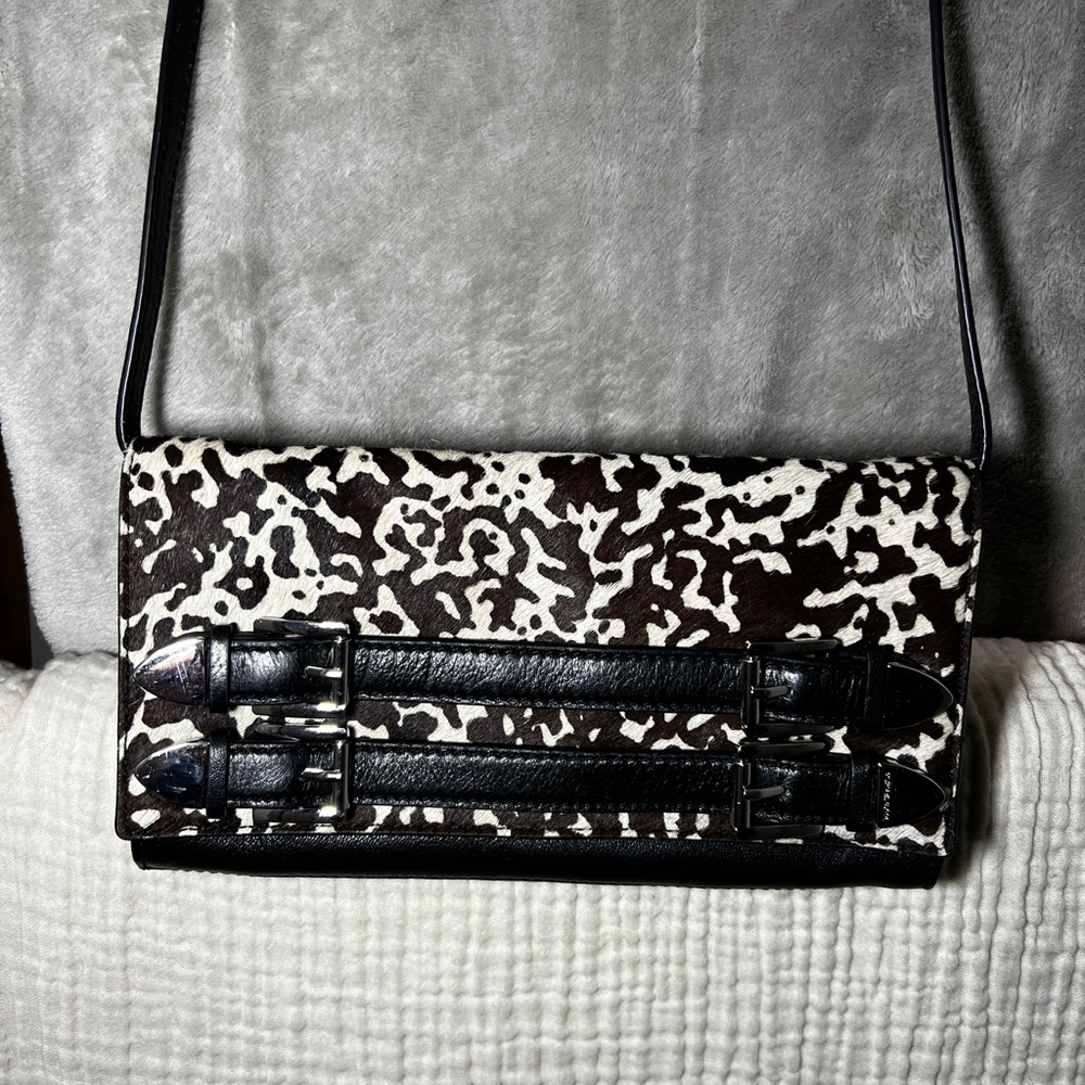 Michael Kors Black and White Cowhide Crossbody Clutch with Buckle Straps
